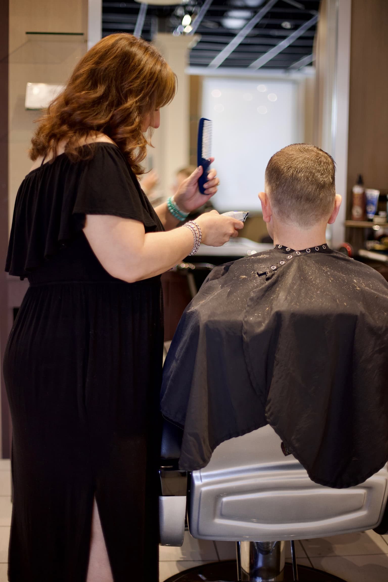 Clipper-over-comb technique for a precise men's haircut at 18|8